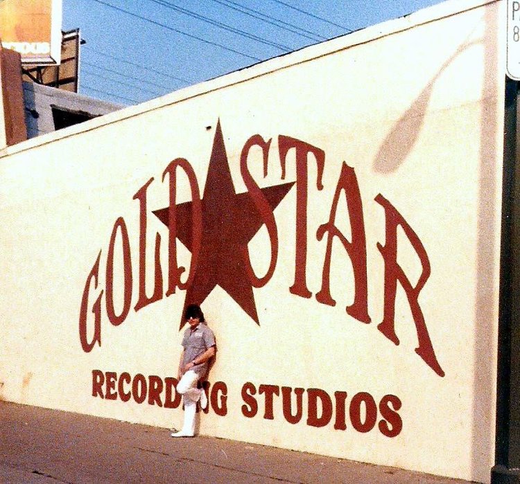 Robert Orbach leaning on the Vine St-facing wall mural of Gold Star Recording Studios